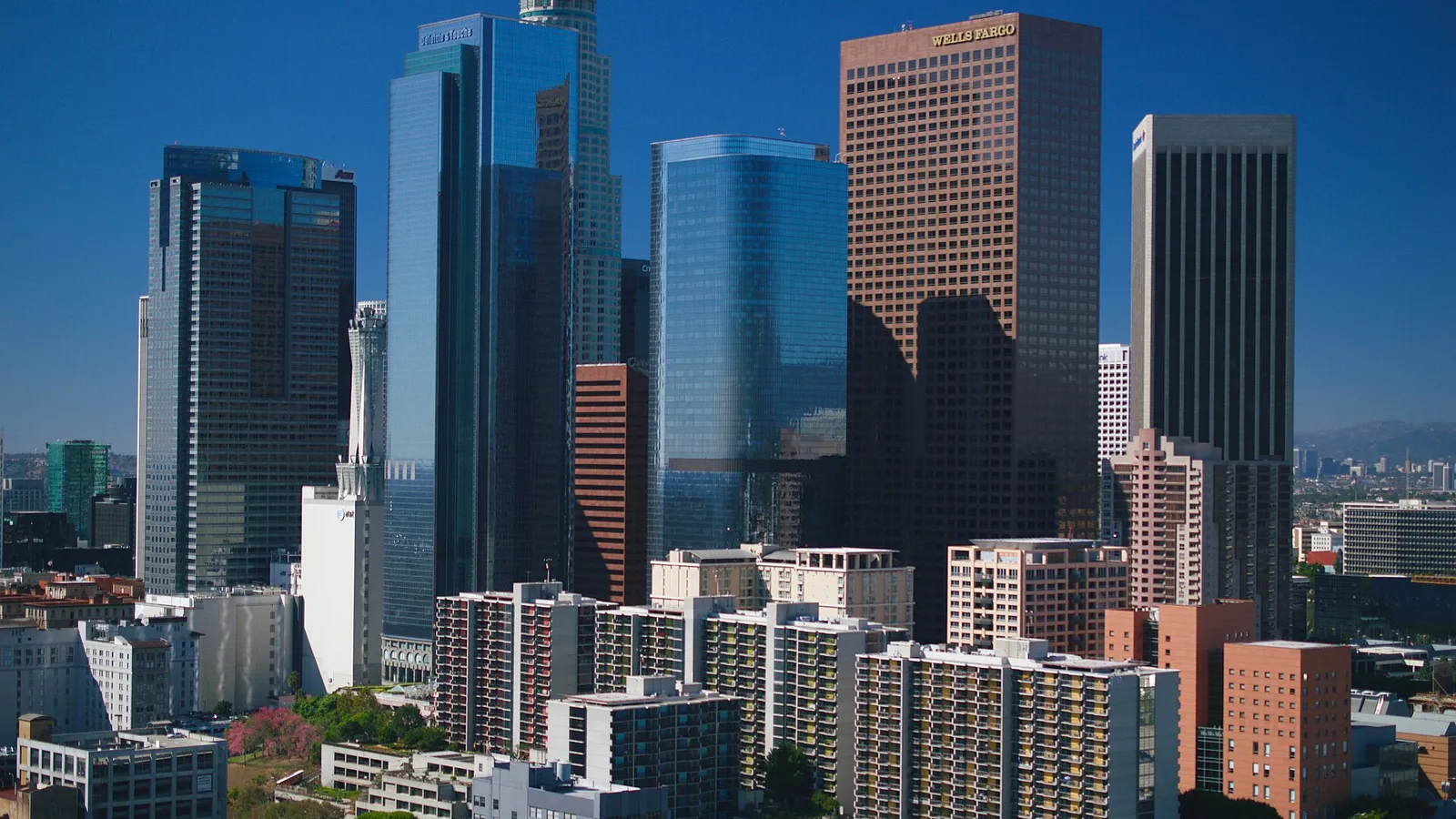 Downtown Los Angeles office towers under a blue sky